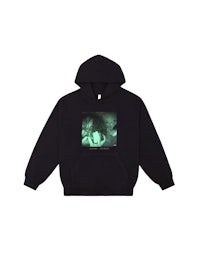 a black hoodie with an image of a woman in a green hoodie
